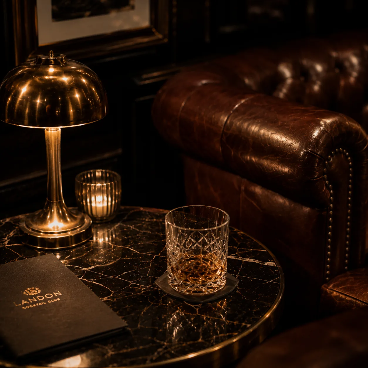 Lounge detail with lamp and leather seating